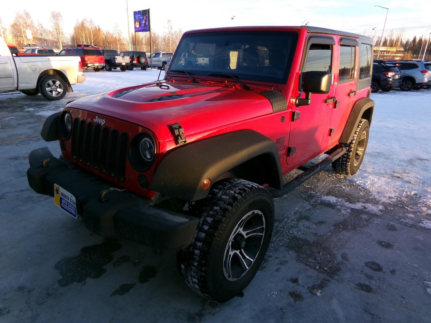 2015 Red /Black Jeep Wrangler Unlimited (1C4HJWEG0FL) with an 3.6L V6 DOHC 24V FFV engine, located at 2630 Philips Field Rd., Fairbanks, AK, 99709, (907) 458-0593, 64.848068, -147.780609 - Photo#0